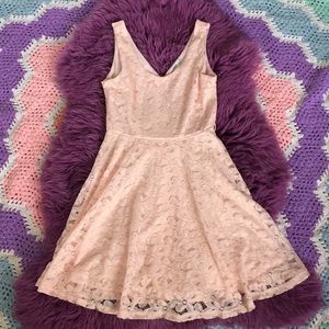 A casual fitted light pink dress